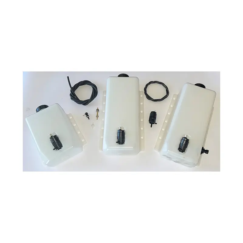 A group of three white boxes with wires attached to them.