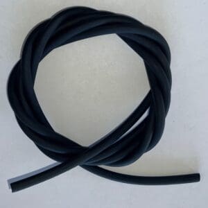 Twisted black rubber tubing on white background.